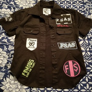 Famous stars and straps, button down fitted patch shirt is being swapped online for free