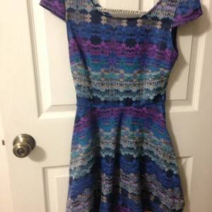Blue/purple dress. is being swapped online for free
