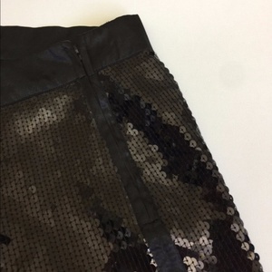 H & M Black Sequin Mini Skirt is being swapped online for free
