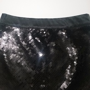 H & M Black Sequin Mini Skirt is being swapped online for free