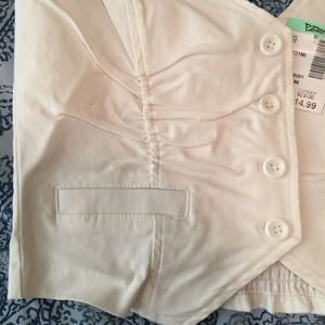 Brand New White Vest Size Small is being swapped online for free