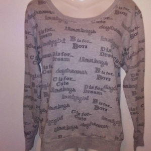 Forever 21 Grey Expressions Print Sweatshirt Size Medium is being swapped online for free