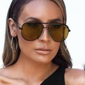 Quay x Desi Perkins Sahara Sunglasses Olive is being swapped online for free