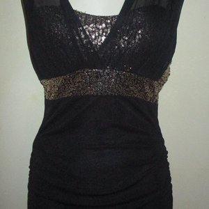 Beautiful Chic and sexy long tank top :) is being swapped online for free
