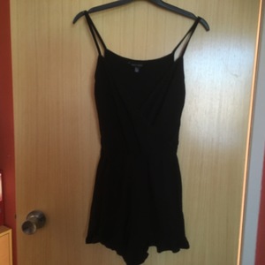 Black Strappy Playsuit New Look UK 8 is being swapped online for free