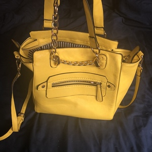 Charming Charlie Yellow Purse is being swapped online for free