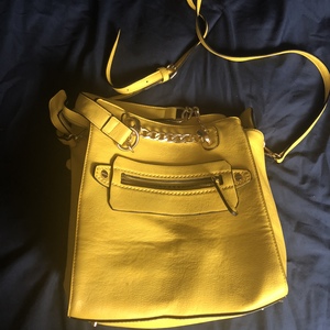 Charming Charlie Yellow Purse is being swapped online for free