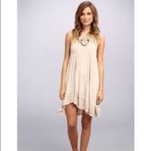 NWT Free People beige Crochet Dress xs is being swapped online for free