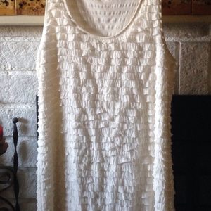 Free people beige ruffle dress or long top is being swapped online for free