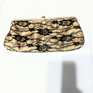 NWT nine West satin lace clutch is being swapped online for free