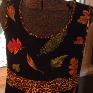 Black orange leaf dress with leopard trim is being swapped online for free
