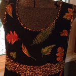 Black orange leaf dress with leopard trim is being swapped online for free