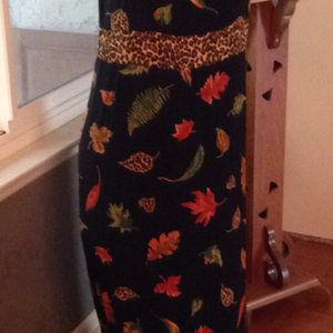 Black orange leaf dress with leopard trim is being swapped online for free