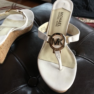Michael Kors White sandals is being swapped online for free