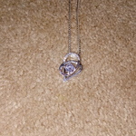 Silver double hearted necklace with 1 diamond. Saying that I love you to the Moon and Stars! is being swapped online for free