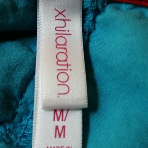 Xhiliration Teal Bird Print Dress with Heart Cutout is being swapped online for free