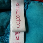 Xhiliration Teal Bird Print Dress with Heart Cutout is being swapped online for free