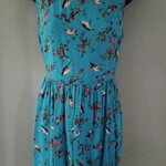 Xhiliration Teal Bird Print Dress with Heart Cutout is being swapped online for free