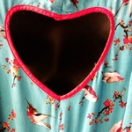 Xhiliration Teal Bird Print Dress with Heart Cutout is being swapped online for free