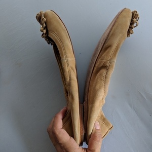Coach Ariza Beige Gold Logo Flats is being swapped online for free