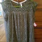 Green lacy new with tags shirt. Size medium. Xhilaration brand is being swapped online for free