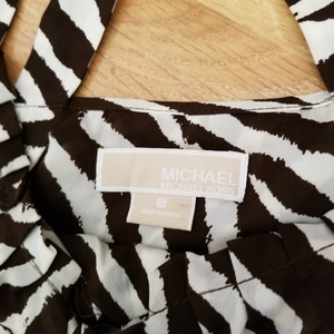 Michael Kors Silk Sleeveless Top is being swapped online for free
