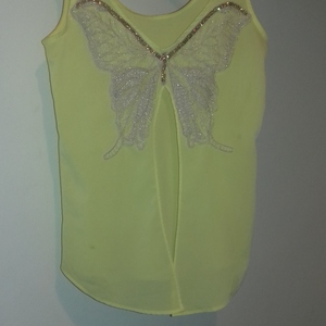 Cute butterfly blouse is being swapped online for free