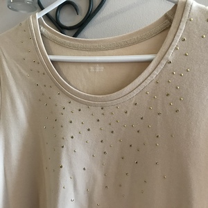 Beige with studs top, size large is being swapped online for free