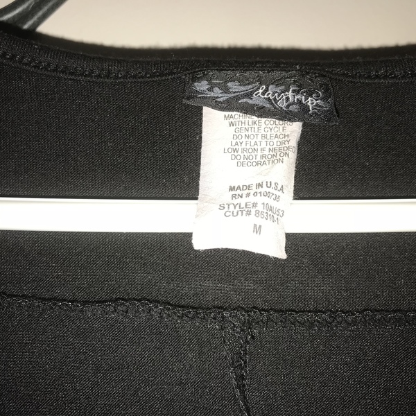 Day Trip v-neck black top is being swapped online for free