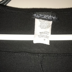 Day Trip v-neck black top is being swapped online for free