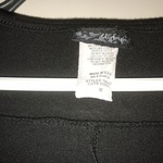 Day Trip v-neck black top is being swapped online for free