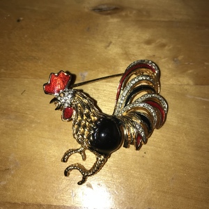 Rooster brooch is being swapped online for free