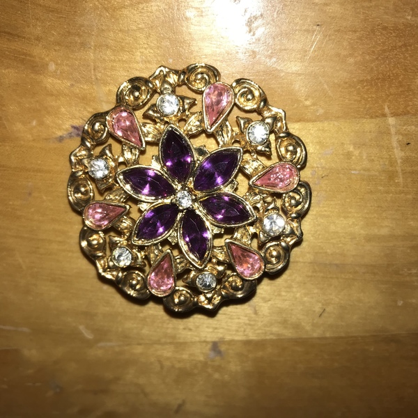 Pink and purple brooch is being swapped online for free