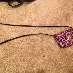Pink purple cheetah print purse bad off shoulder or side is being swapped online for free
