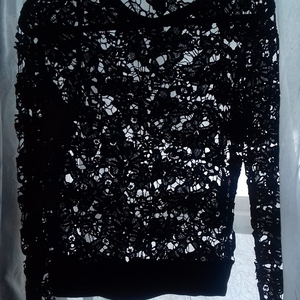Lacey black long sleeve is being swapped online for free