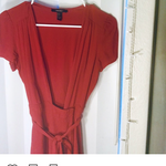 Red low-cut wrap dress  is being swapped online for free