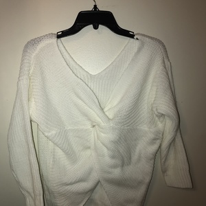 Women's white knit crossed sweater size small is being swapped online for free