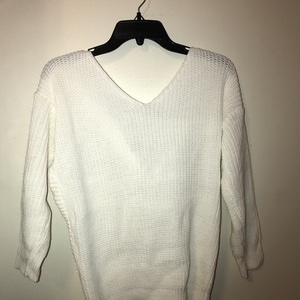 Women's white knit crossed sweater size small is being swapped online for free