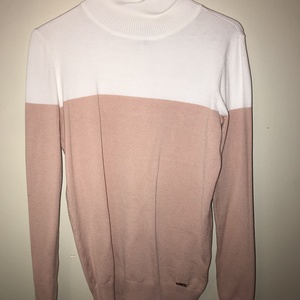 Calvin Klein pink & white turtleneck long sleeve sweater size small is being swapped online for free