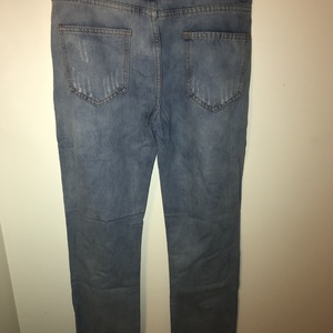 Women's destroyed light wash denim jeans size small is being swapped online for free