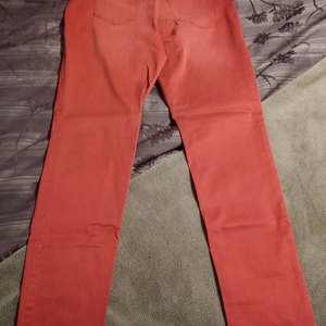 Maurices women's stretch L- regular orange faded look pants is being swapped online for free
