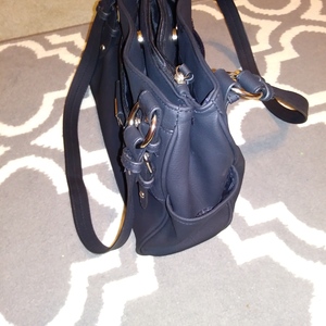 Rosetti Black Zipper Handbag Purse Faux Leather Lots of Pockets Used Once is being swapped online for free