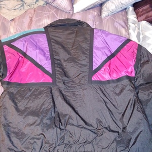 Womens Large Black w Purple Pink blue winter coat is being swapped online for free