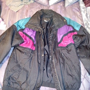 Womens Large Black w Purple Pink blue winter coat is being swapped online for free