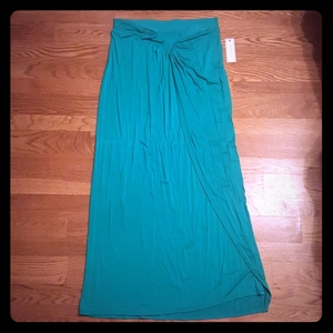 Bisou Bisou Teal Maxi Skirt  is being swapped online for free