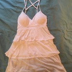 White dress size 12-14 never worn is being swapped online for free