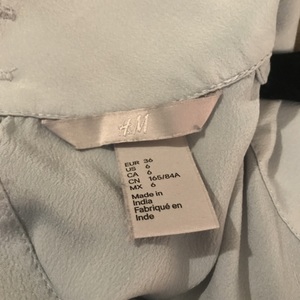 H&M Light Blue Blouse is being swapped online for free