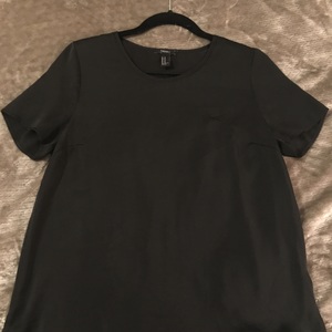 Black Short Sleeve Open-Back Blouse is being swapped online for free