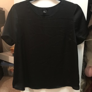 Black Short Sleeve Open-Back Blouse is being swapped online for free