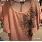 Pink and Grey Flower Sweater is being swapped online for free